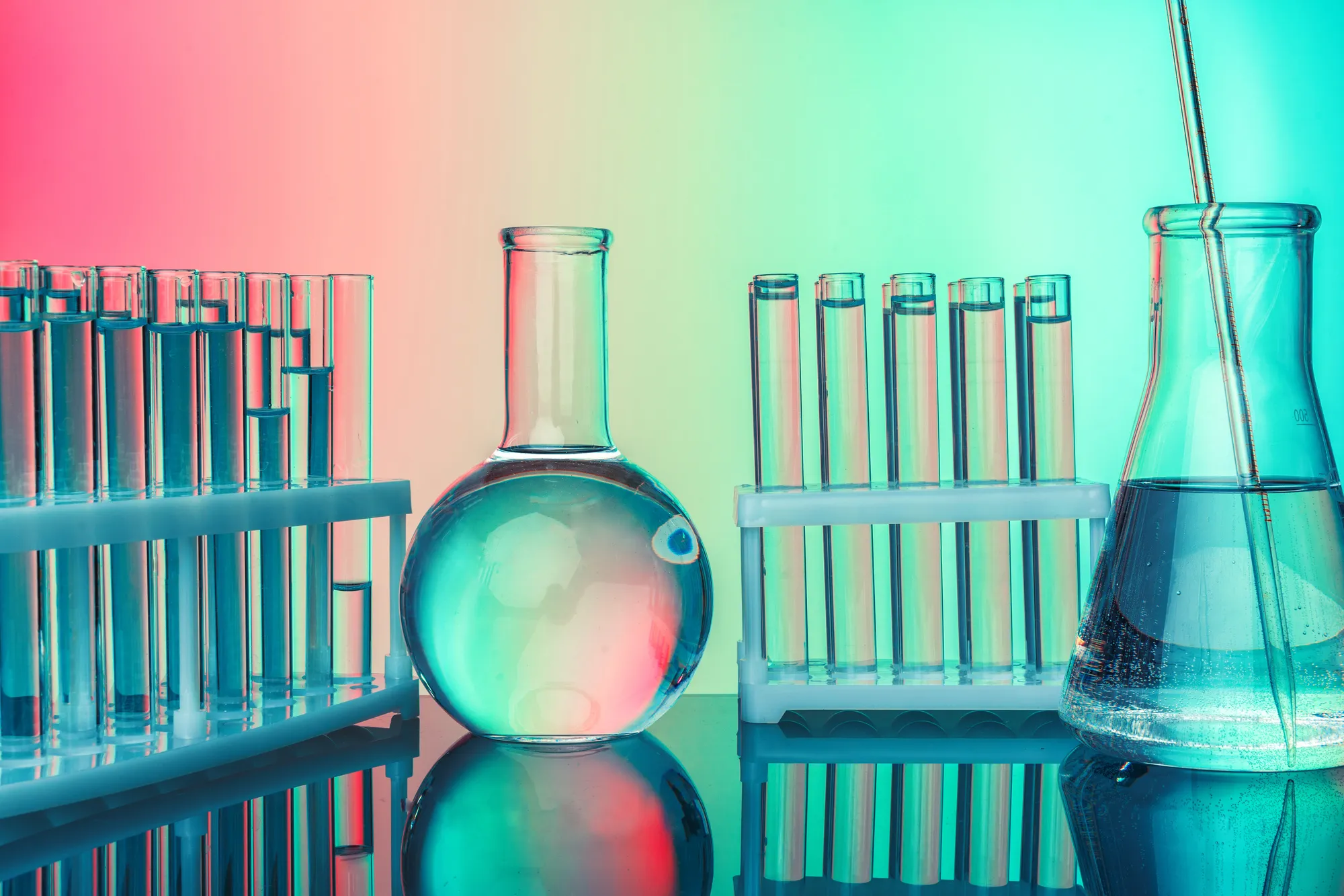 Merxally row-of-test-tubes-with-liquids-on-blue-and-green-t-image